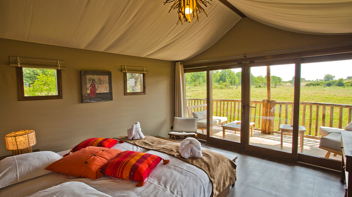 Profitez d'une magnifique chambre parentale avec une vue imprenable sur la savane
